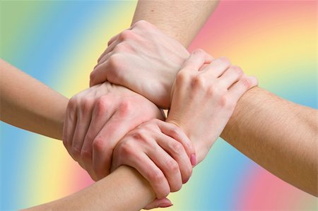 simsearch:700-00046258,k - four hands touching each other, close-up Stock Photo - Budget Royalty-Free & Subscription, Code: 400-04663910