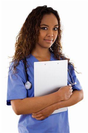 Stock image of woman wearing scrubs over white background Stock Photo - Budget Royalty-Free & Subscription, Code: 400-04674973