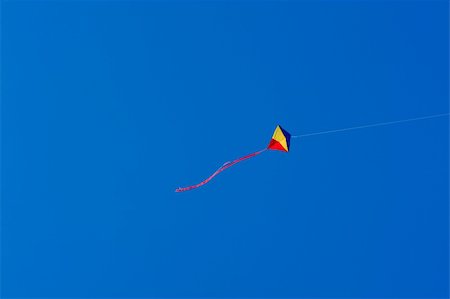 Flying kite in the blue sky Stock Photo - Budget Royalty-Free & Subscription, Code: 400-04675356