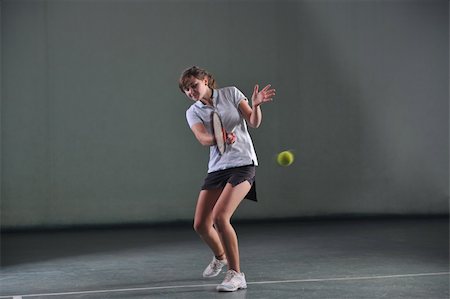 simsearch:400-04833689,k - young girl exercise tennis sport indoor Stock Photo - Budget Royalty-Free & Subscription, Code: 400-04676025