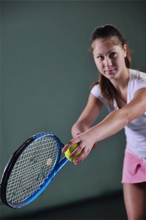 simsearch:400-04833689,k - young girl exercise tennis sport indoor Stock Photo - Budget Royalty-Free & Subscription, Code: 400-04676028