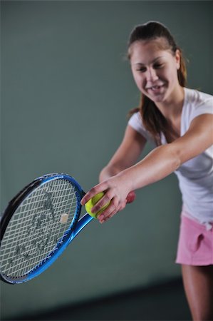 simsearch:400-04833689,k - young girl exercise tennis sport indoor Stock Photo - Budget Royalty-Free & Subscription, Code: 400-04676029