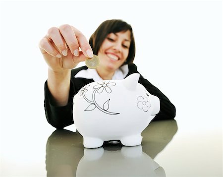 simsearch:6108-05874788,k - happy young business woman isolated on white puting euro money in piggy bank Foto de stock - Super Valor sin royalties y Suscripción, Código: 400-04676094