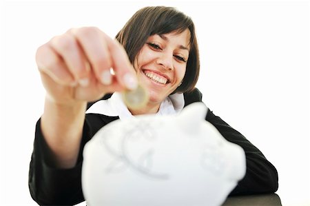 simsearch:6108-05874788,k - happy young business woman isolated on white puting euro money in piggy bank Foto de stock - Super Valor sin royalties y Suscripción, Código: 400-04676096