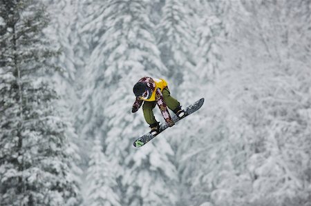 simsearch:400-03985663,k - young boys jumping in air ind showing trick with snowboard at winter season Stock Photo - Budget Royalty-Free & Subscription, Code: 400-04676176