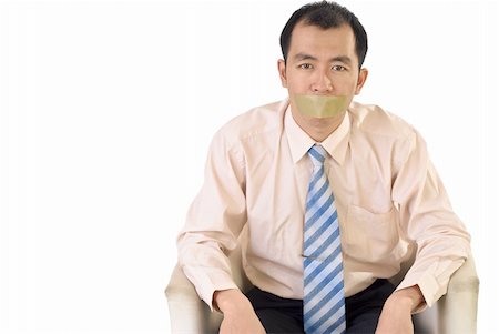 simsearch:400-04175955,k - Silent businessman with tape on mouth sit on white background. Stock Photo - Budget Royalty-Free & Subscription, Code: 400-04679254