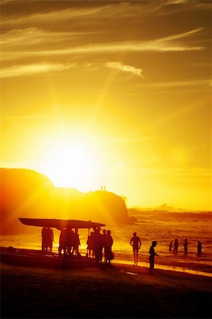 simsearch:400-07748817,k - Group of people at sunset on the beach with a few kayak's. Stock Photo - Budget Royalty-Free & Subscription, Code: 400-04679325