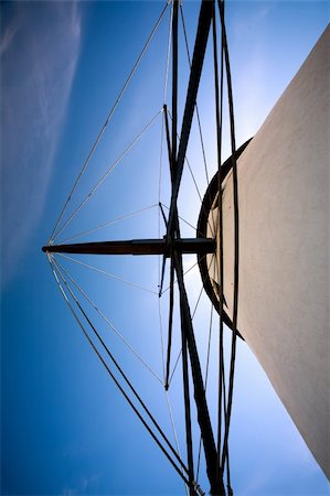 simsearch:400-05319608,k - A close up look at a windmill. Looking directly up at the mill with blue skies behind it. Stock Photo - Budget Royalty-Free & Subscription, Code: 400-04679953