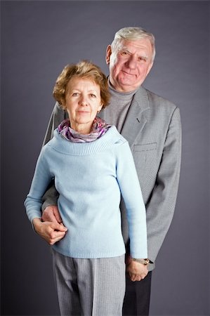 Senior Couple Isolated on a Grey Background Photographie de stock - Aubaine LD & Abonnement, Code: 400-04671205