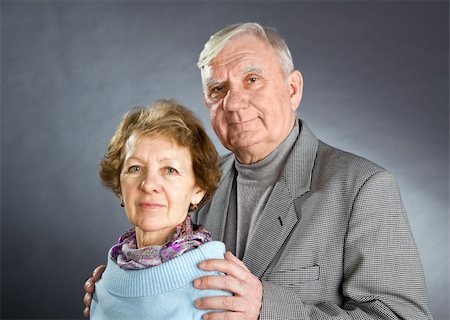 Senior Couple Isolated on a Grey Background Photographie de stock - Aubaine LD & Abonnement, Code: 400-04671206