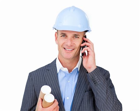 Attractive male architect on phone against a white background Stock Photo - Budget Royalty-Free & Subscription, Code: 400-04687202
