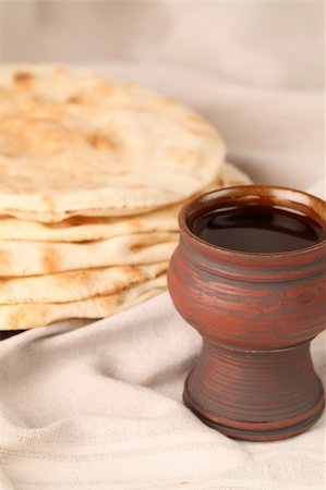 Chalice with red wine and pita bread Stock Photo - Budget Royalty-Free & Subscription, Code: 400-04687295