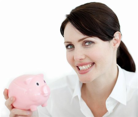 simsearch:400-05715207,k - Beautiful businesswoman holding a piggybank isolated on a white background Stock Photo - Budget Royalty-Free & Subscription, Code: 400-04687361