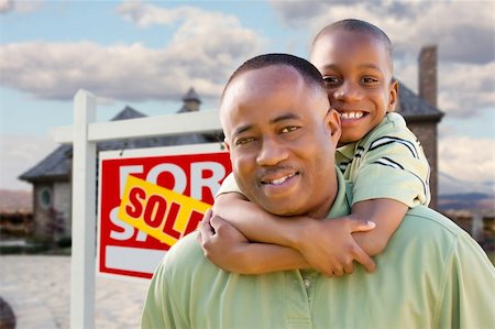 simsearch:693-03308239,k - Happy African American Father and Son in Front of New Home and Real Estate Sign. Stock Photo - Budget Royalty-Free & Subscription, Code: 400-04680156