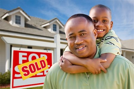 simsearch:693-03308239,k - Happy African American Father and Son in Front of New Home and Sold Real Estate Sign. Stock Photo - Budget Royalty-Free & Subscription, Code: 400-04680208