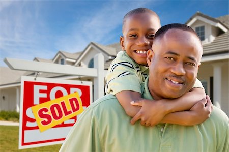 simsearch:693-03308239,k - Happy African American Father and Son in Front of New Home and Sold Real Estate Sign. Stock Photo - Budget Royalty-Free & Subscription, Code: 400-04680209