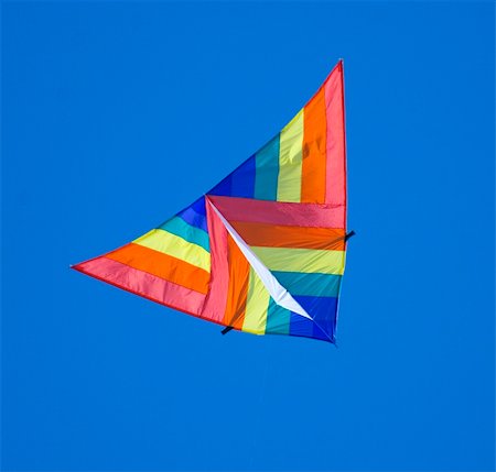 A coloured kite on a blue sky. Stock Photo - Budget Royalty-Free & Subscription, Code: 400-04683404