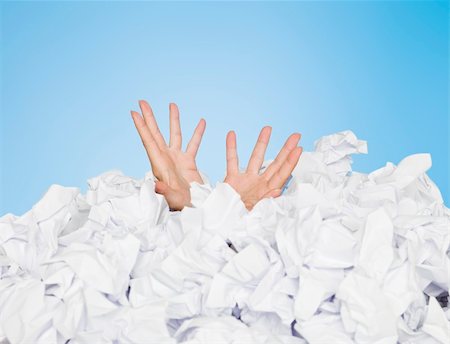 Human buried in papers on blue background Stock Photo - Budget Royalty-Free & Subscription, Code: 400-04694269
