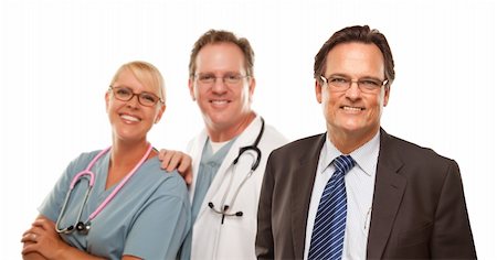 Smiling Businessman with Male and Female Doctor or Nurse Isolated on a White Background. Stock Photo - Budget Royalty-Free & Subscription, Code: 400-04695257