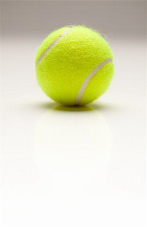 simsearch:400-04833689,k - Single Tennis Ball with Slight Reflection on a Gradated Background. Stock Photo - Budget Royalty-Free & Subscription, Code: 400-04696278