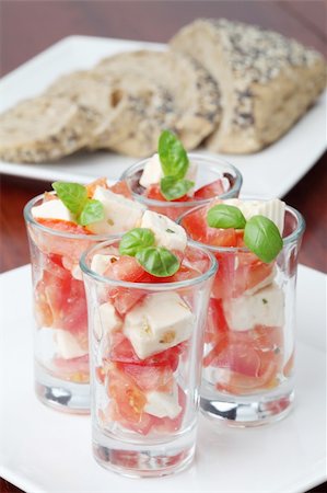 simsearch:700-01099893,k - Appetizers with tomatoes, mozzarella and basil in small glasses Stock Photo - Budget Royalty-Free & Subscription, Code: 400-04698181