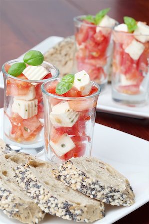 simsearch:700-01099893,k - Appetizers with tomatoes, mozzarella and basil in small glasses Stock Photo - Budget Royalty-Free & Subscription, Code: 400-04698182