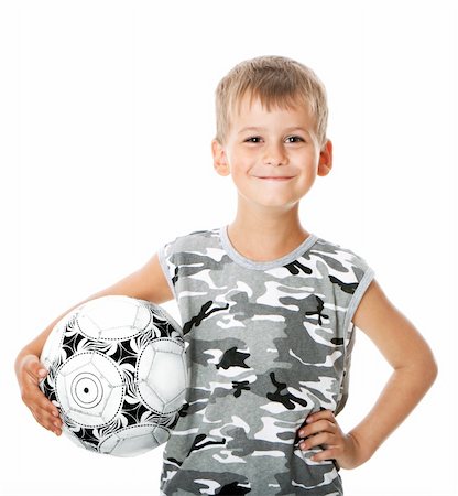 simsearch:400-04638236,k - Boy holding soccer ball  isolated on white background Photographie de stock - Aubaine LD & Abonnement, Code: 400-04698986