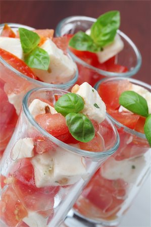 simsearch:700-01099893,k - Appetizers with tomatoes, mozzarella and basil in small glasses Stock Photo - Budget Royalty-Free & Subscription, Code: 400-04699508