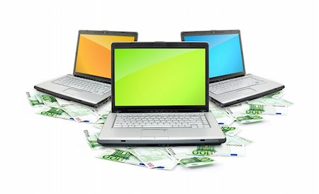 simsearch:400-04011910,k - Open laptop with money  isolated on white background Stock Photo - Budget Royalty-Free & Subscription, Code: 400-04699869