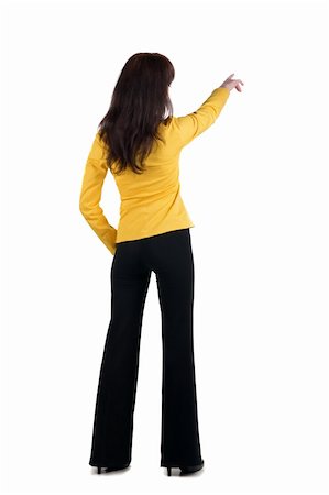 simsearch:400-04586134,k - Young woman points at wall. The rear view . Stock Photo - Budget Royalty-Free & Subscription, Code: 400-04690355