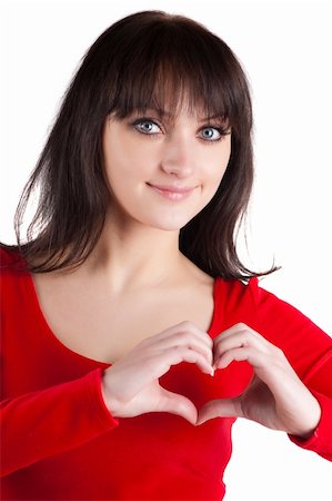 young beautiful woman showing heart symbol. Isolated over white background . Foto de stock - Super Valor sin royalties y Suscripción, Código: 400-04690364