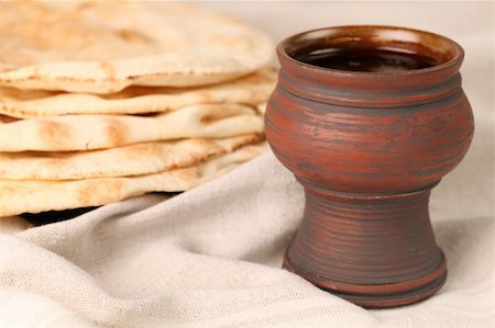 Chalice with red wine and pita bread Stock Photo - Budget Royalty-Free & Subscription, Code: 400-04691038