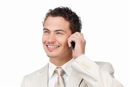 simsearch:400-05145011,k - Smiling young businessman on phone against a white background Stock Photo - Budget Royalty-Free & Subscription, Code: 400-04691252