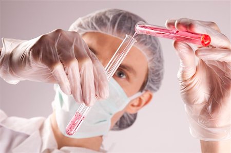 simsearch:400-09011632,k - Scientist working in laboratory arranged in studio Stock Photo - Budget Royalty-Free & Subscription, Code: 400-04691976