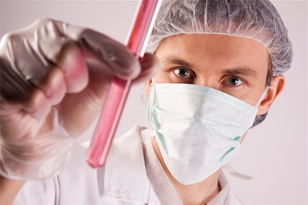 simsearch:400-09011632,k - Scientist working in laboratory arranged in studio Stock Photo - Budget Royalty-Free & Subscription, Code: 400-04691977