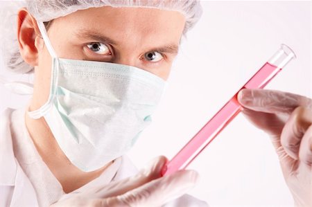 simsearch:400-09011632,k - Scientist working in laboratory arranged in studio Stock Photo - Budget Royalty-Free & Subscription, Code: 400-04691978