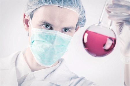 simsearch:400-09011632,k - Scientist working in laboratory arranged in studio Stock Photo - Budget Royalty-Free & Subscription, Code: 400-04691971