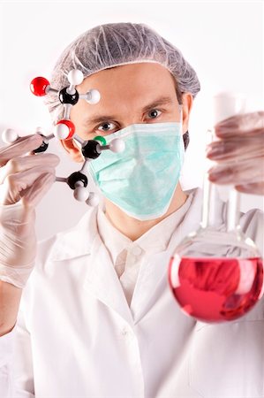 simsearch:400-09011632,k - Scientist working in laboratory arranged in studio Stock Photo - Budget Royalty-Free & Subscription, Code: 400-04691972