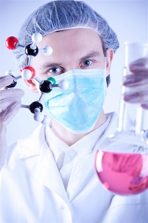 simsearch:400-09011632,k - Scientist working in laboratory arranged in studio Stock Photo - Budget Royalty-Free & Subscription, Code: 400-04691973