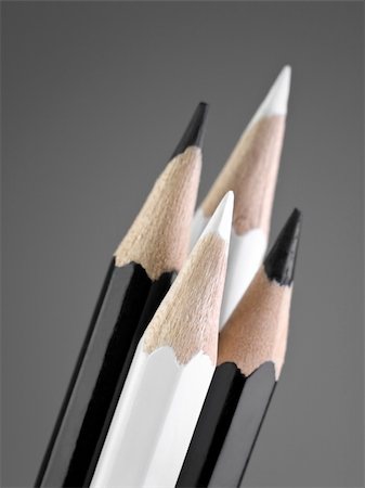 pencil crayon - Four sharped pencils. Two black and two white. Foto de stock - Super Valor sin royalties y Suscripción, Código: 400-04693266