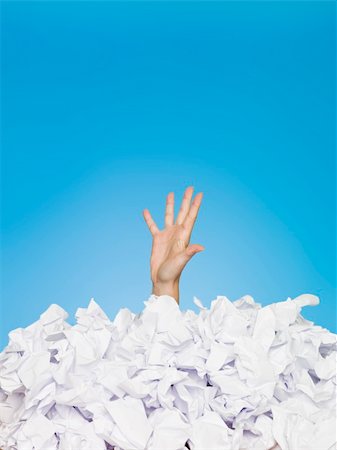 Human buried in papers on blue background Stock Photo - Budget Royalty-Free & Subscription, Code: 400-04693783