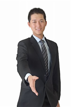 Young business man shake hand, closeup portrait of Asian on white background. Stock Photo - Budget Royalty-Free & Subscription, Code: 400-04704645
