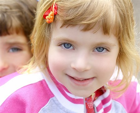 simsearch:400-05153083,k - blond little beautiful girl portrait funny gesturing blue eyes face Stock Photo - Budget Royalty-Free & Subscription, Code: 400-04705257