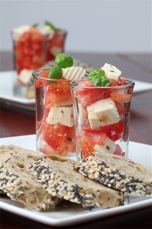 simsearch:700-01099893,k - Appetizers with tomatoes, mozzarella and basil in small glasses Stock Photo - Budget Royalty-Free & Subscription, Code: 400-04707318