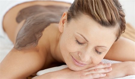 simsearch:400-04192063,k - Charming woman enjoying a mud skin treatment in a Spa center Stock Photo - Budget Royalty-Free & Subscription, Code: 400-04701481