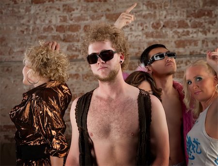 simsearch:400-04206686,k - Disco pose with friends at a 1970s Disco Music Party Stock Photo - Budget Royalty-Free & Subscription, Code: 400-04701491