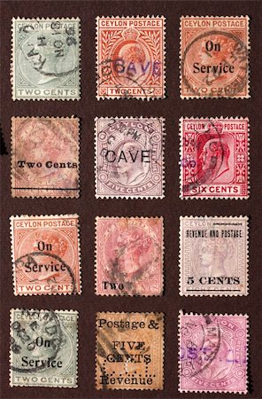 simsearch:400-04832369,k - Close up of ancient old postal stamps Photographie de stock - Aubaine LD & Abonnement, Code: 400-04701849
