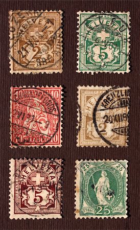 simsearch:400-04832369,k - Close up of ancient old postal stamps Photographie de stock - Aubaine LD & Abonnement, Code: 400-04701865