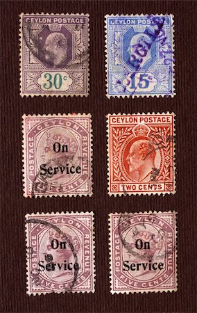 simsearch:400-04832369,k - Close up of ancient old postal stamps Photographie de stock - Aubaine LD & Abonnement, Code: 400-04701880