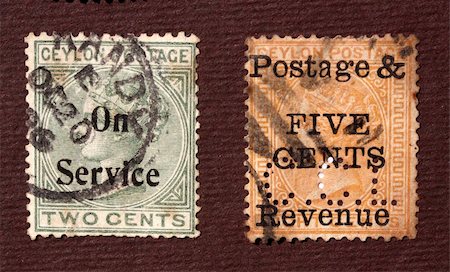 simsearch:400-04832369,k - Close up of ancient old postal stamps Photographie de stock - Aubaine LD & Abonnement, Code: 400-04701890